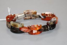 A white metal mounted Scottish hardstone and agate set demi-lune link bracelet, approx. 19.6cm.