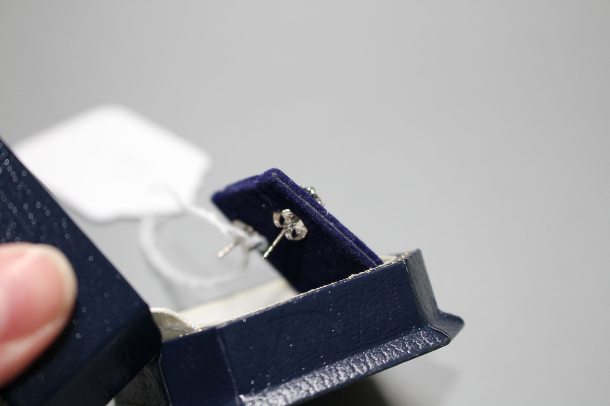 A pair of 18ct white gold and solitaire diamond ear studs, with an approximate total carat weight of - Image 6 of 6