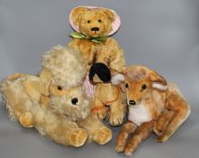 A group of assorted soft toys including teddy bears Condition:- a set of four gold plush bears