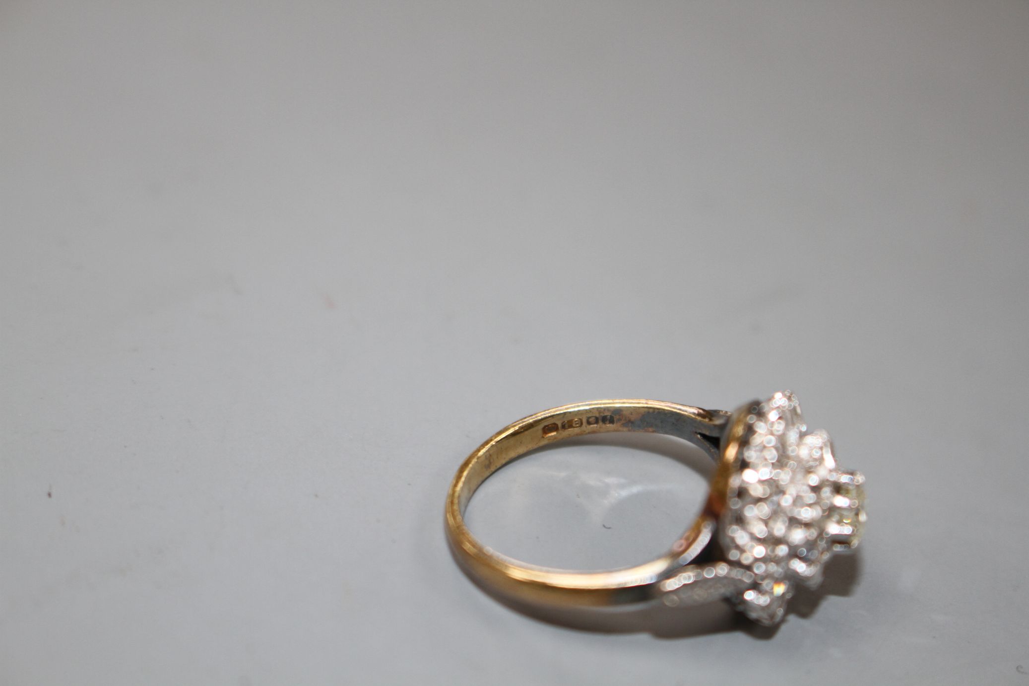 A 1960's 18ct gold and illusion set diamond cluster ring, size J, gross weight 4.6 grams. - Image 4 of 4