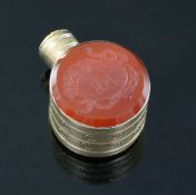 A small 19th century engraved gold and carnelian set moon shaped scent flask, one carnelian carved