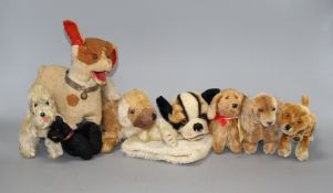 Eight assorted vintage soft toy dogs including Steiff Condition:- 1950's Bully glove puppet - a
