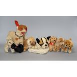 Eight assorted vintage soft toy dogs including Steiff Condition:- 1950's Bully glove puppet - a