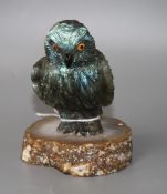 A carved labradorite model of an owl on an agate base, height 12.8cm. Condition: Small flaws that