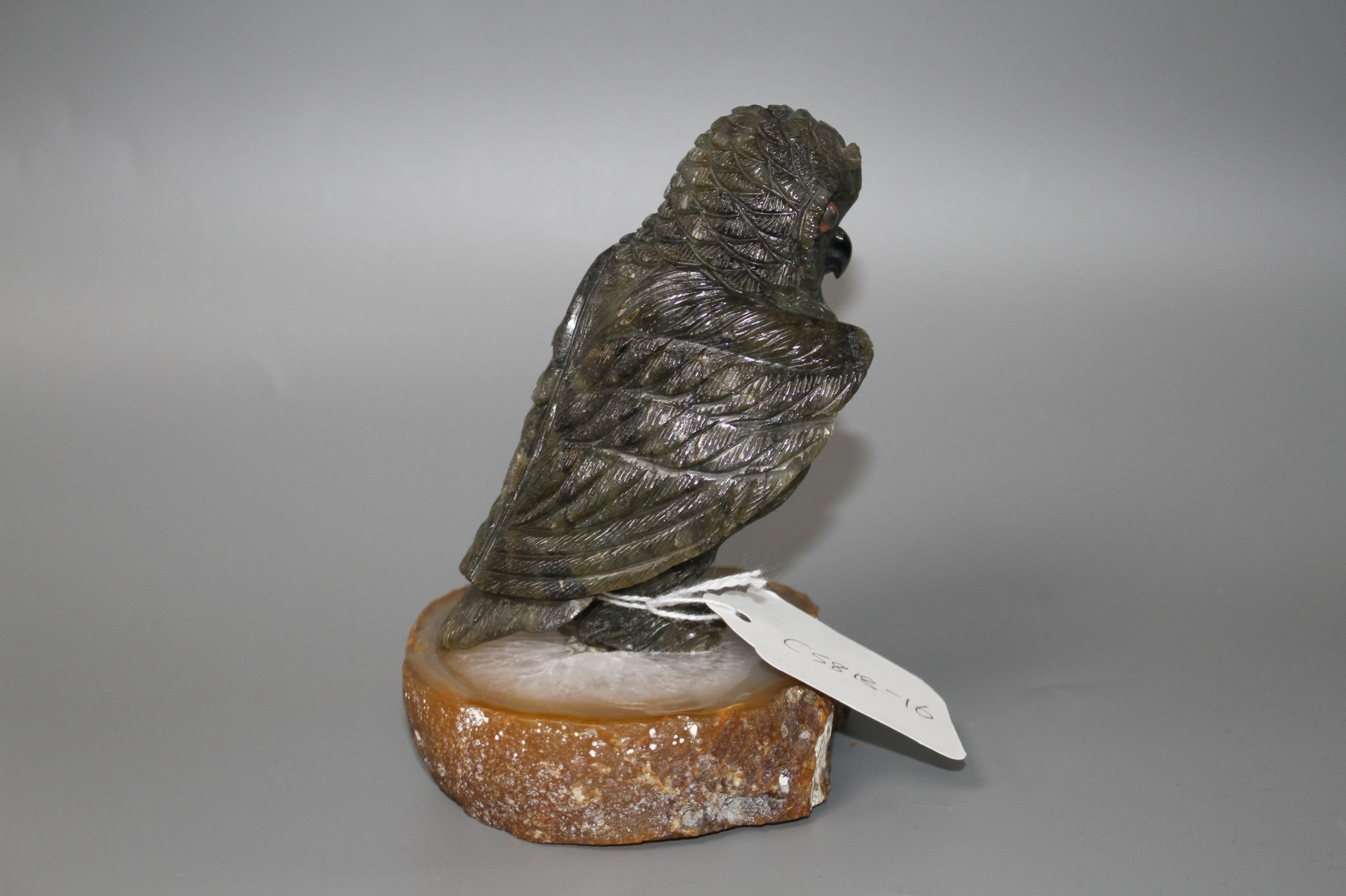 A carved labradorite model of an owl on an agate base, height 12.8cm. Condition: Small flaws that - Image 3 of 4