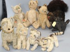 A collection of nine assorted vintage and later soft toy cats including Steiff Condition:- what