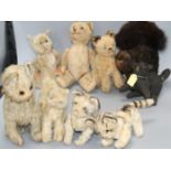 A collection of nine assorted vintage and later soft toy cats including Steiff Condition:- what