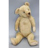 A Chiltern type English bear, c.1930's, 26in., three replaced paw pads, glass eyes