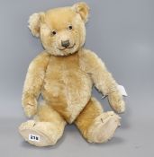 A Chiltern Hugmee bear c.1930's, 19in., blond mohair, good condition, glass eyes and velvet pads