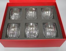 A boxed set of six Baccarat cut glass whisky tumblers, height 9cm, diameter 8cm Condition: All in