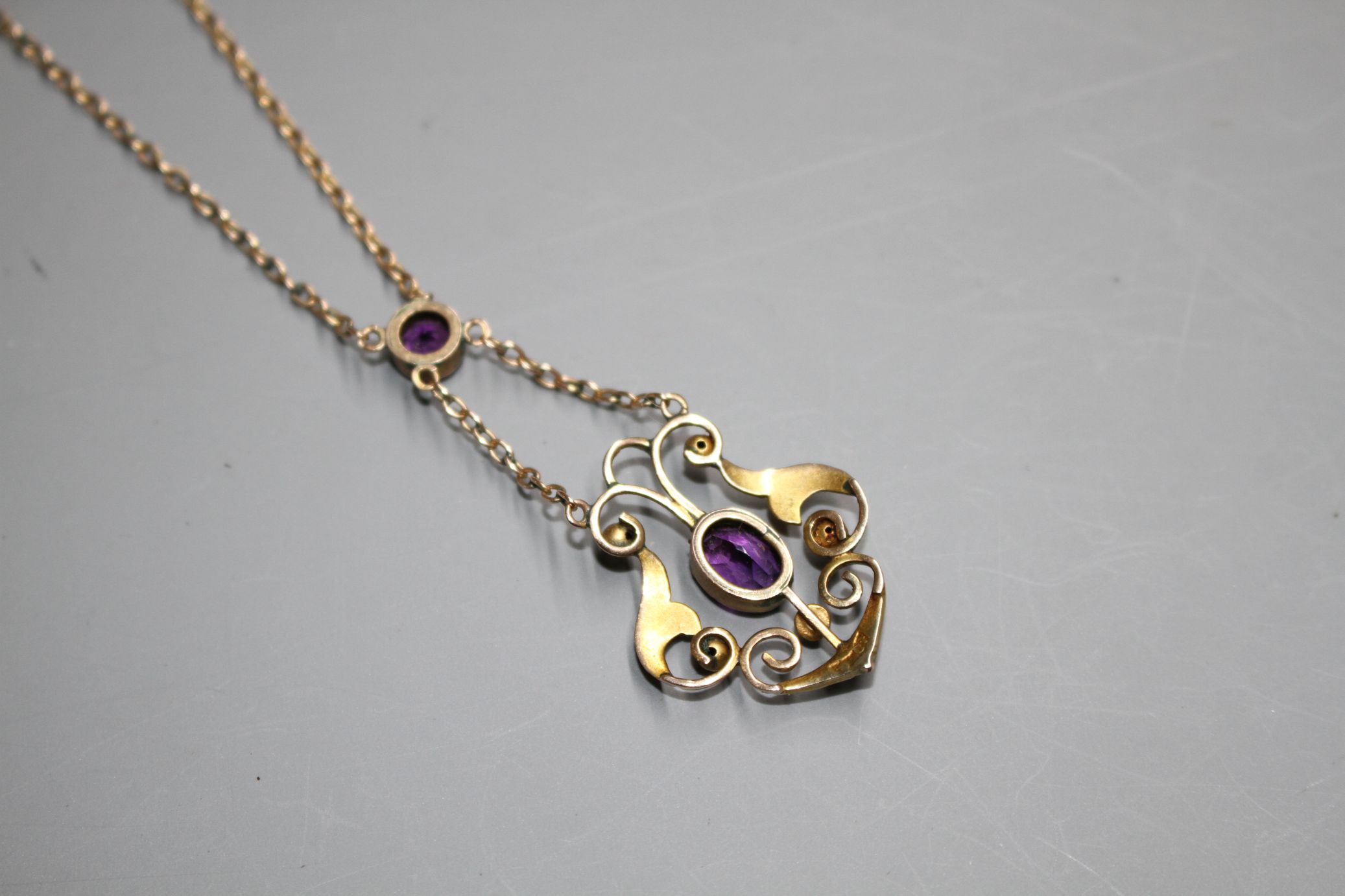An Edwardian 9ct, amethyst and seed pearl set pendant necklace, pendant lower section 25mm. - Image 4 of 4