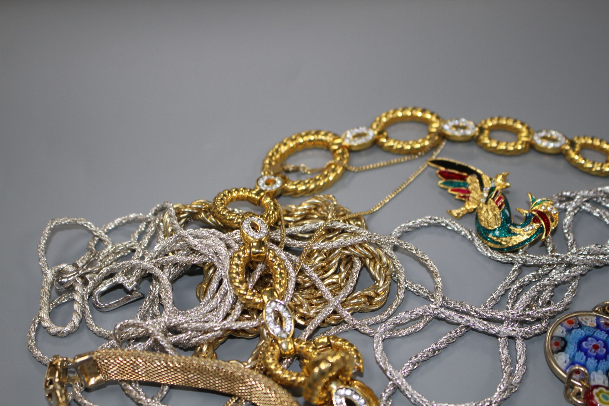 Seven assorted costume necklaces including a millefiore glass necklace, a costume bird brooch and - Image 9 of 10