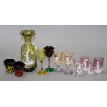 A Mary Gregory style vase, 17cm and ten assorted glass tots Condition: Slightly larger pair of