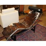 A modernist chromed and black painted steel day bed with pony skin upholstery, L.156cm W.58cm H.80cm