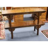 A pair of Chinese softwood bench seats, W.125cm D.33cm H.42cm Condition: Of even matching mid