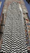A pair of vintage 1970's zebra / chevron print curtains, lined, length 258cm, width at top 120cm,