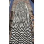 A pair of vintage 1970's zebra / chevron print curtains, lined, length 258cm, width at top 120cm,