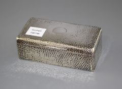 An Edwardian planished silver mounted rectangular cigarette box, Joseph Braham, London, 1903,