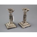 A pair of Edwardian silver corinthian column dwarf candlesticks by Williams Ltd, Birmingham, 1905,