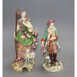 Two Chelsea gold anchor figures of a shepherdess and a huntsman, c.1765, 27.5 and 22.5cm