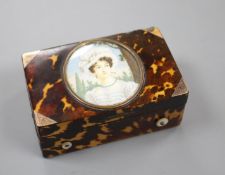 A late 19th century Swiss gold mounted tortoiseshell musical box, inset with a miniature of a