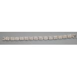 A modern 14k white metal and diamond encrusted octagonal link bracelet, 18.3cm, gross weight, 35.8