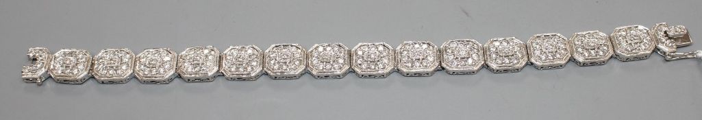 A modern 14k white metal and diamond encrusted octagonal link bracelet, 18.3cm, gross weight, 35.8