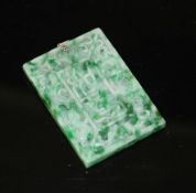 A carved jadeite and diamond set rectangular pendant, both sides decorated with Chinese characters