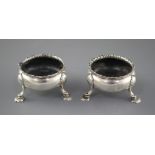 A pair of Georgian silver bun salts, circa, 1760-1780, (marks rubbed), diameter 65mm, 4.5oz.