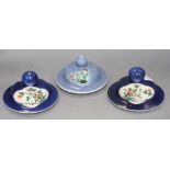 Three Chinese blue ground covers, late 19th century, including a pair with famille verte reserves,