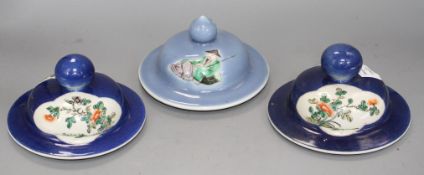 Three Chinese blue ground covers, late 19th century, including a pair with famille verte reserves,