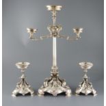 A Victorian electroplated three-piece table garniture by Elkington & Co. (lacking glass bowls),