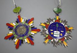Two Chinese enamelled white metal award medals, largest 12cm