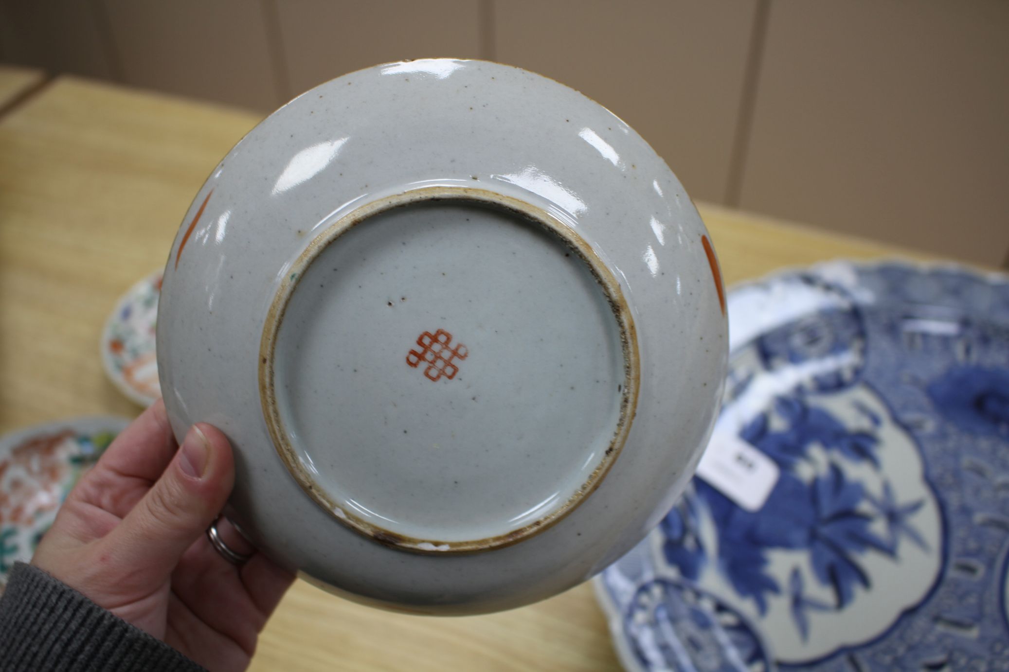 A near set of six 19th century Chinese famille rose saucer dishes, each painted with fruit and - Image 5 of 6