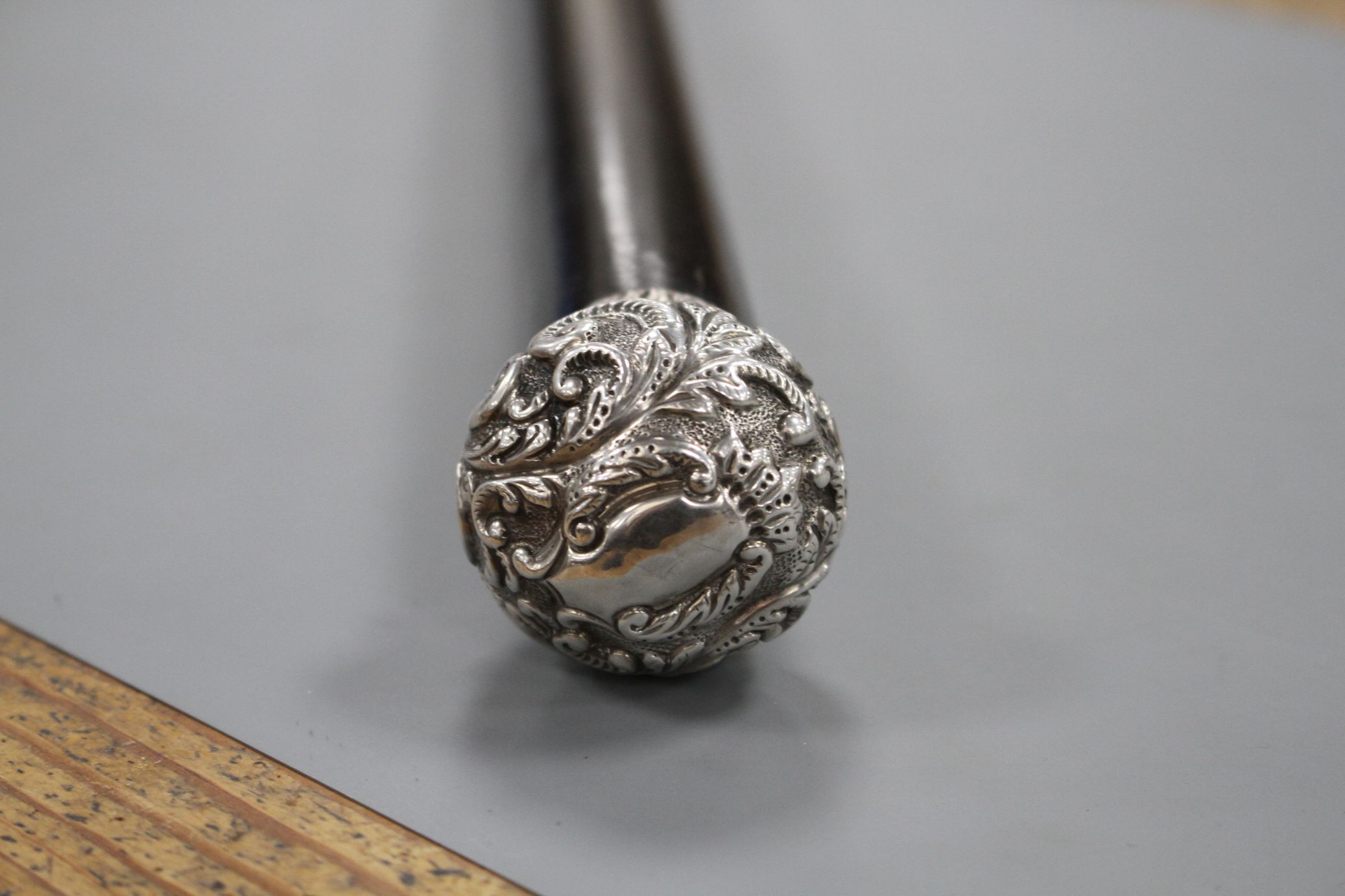 A Victorian walking stick with embossed silver pommel H.M., Birmingham 1906, opens to reveal a - Image 4 of 10