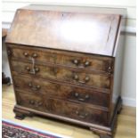 A George III mahogany bureau, W.92cm D.50cm H.104cm Condition: Good even mid to dark dull brown to