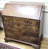 A George III mahogany bureau, W.92cm D.50cm H.104cm Condition: Good even mid to dark dull brown to