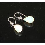 A pair of white metal, pear shaped white opal and diamond set drop earrings, opals approx. 12mm,