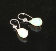 A pair of white metal, pear shaped white opal and diamond set drop earrings, opals approx. 12mm,