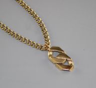 An unmarked heavy gold (tests as 9ct) curblink chain with large double curblink pendant, chain 65cm,
