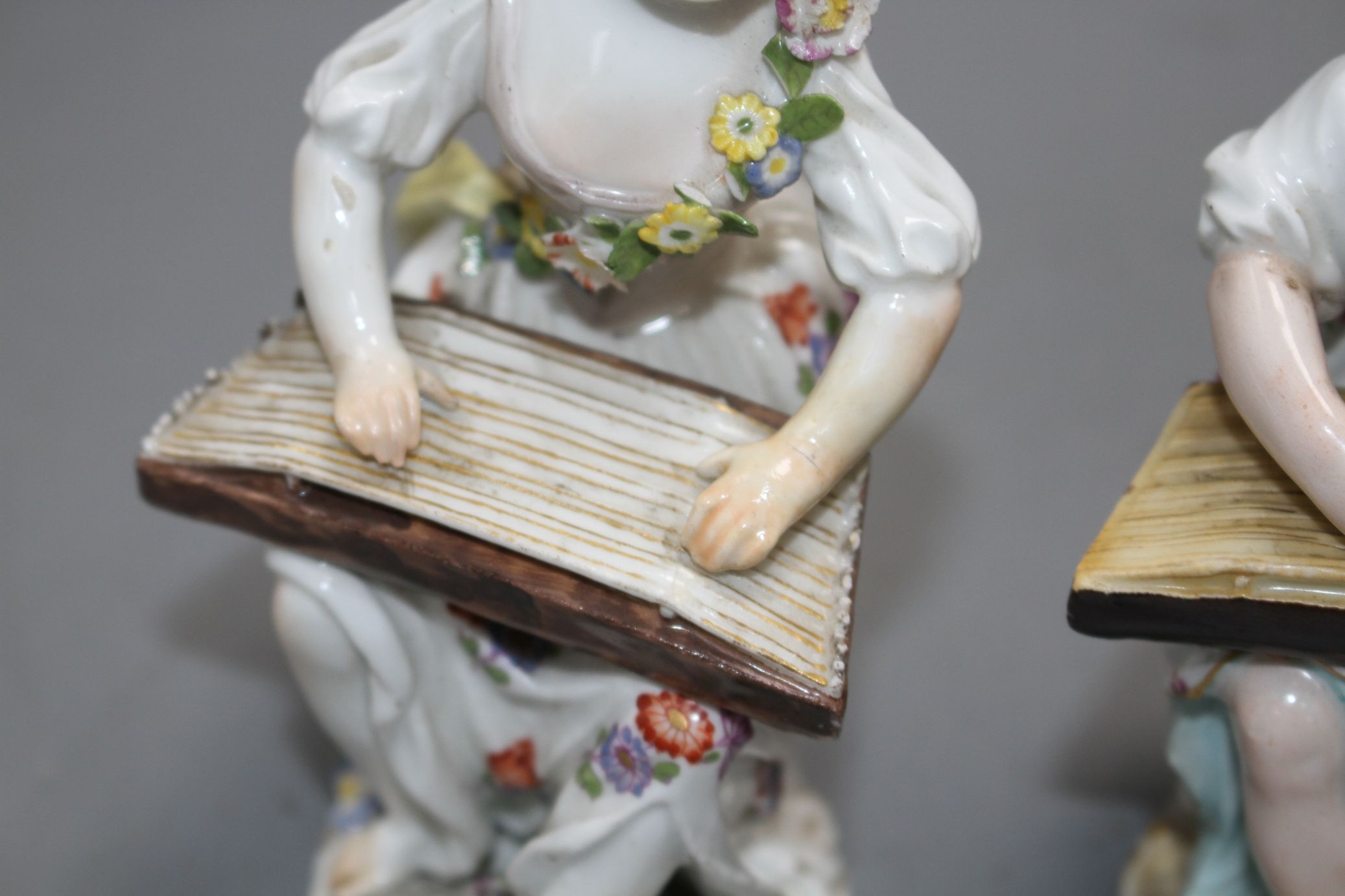 An 18th century Meissen figure of a girl playing a zither and a 19th century Meissen figure of a - Image 2 of 6