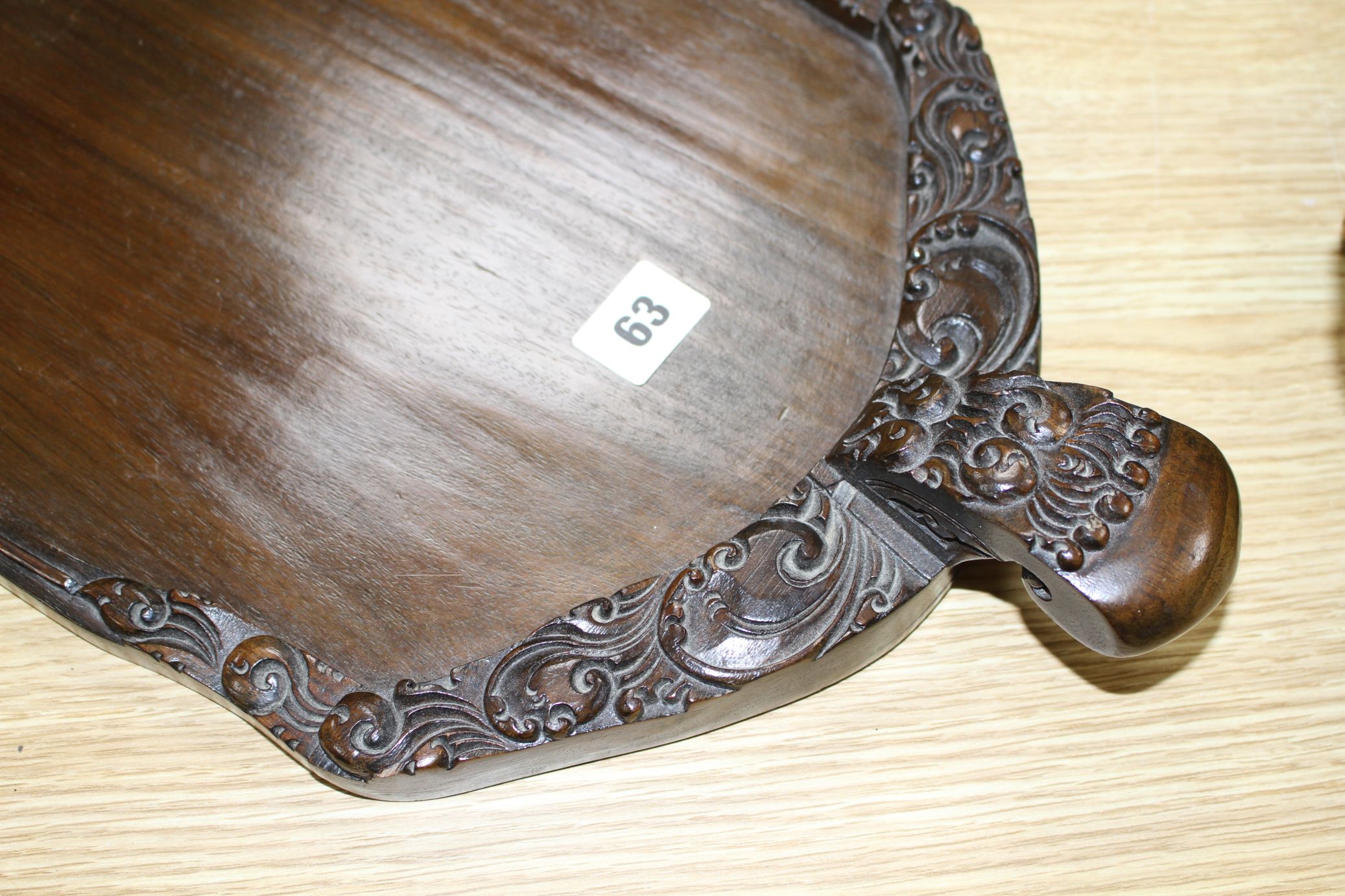 A Burmese carved hardwood tray, 70cm Condition: In good condition, minor scuffing to underside - Image 2 of 4
