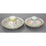 Two graduated Chinese famille rose bowls and cover, 20th century, each decorated with inscriptions