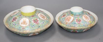 Two graduated Chinese famille rose bowls and cover, 20th century, each decorated with inscriptions