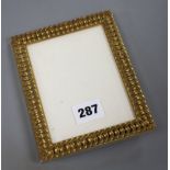 An Hermes of Paris gilt brass photograph frame, height 15.5cm aperture 12 x 9cm Condition: Very good