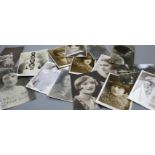 A collection of approximately forty autographed photographs and postcards of early 20th century