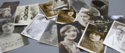 A collection of approximately forty autographed photographs and postcards of early 20th century