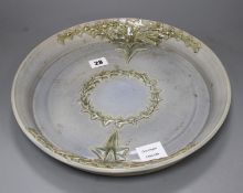 A Studio pottery tray, decorated with ivy leaves, seal mark to rim JC, diameter 35cm Condition: A