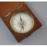 An early 19th century mahogany cased pocket compass, the dial marked in quadrants of ten degree