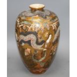 A Japanese Satsuma vase, decorated with a dragon and immortals, signed to the base, height 36cm